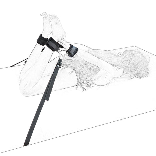 Sketch of a woman demonstrating the under-the-bed restraint system with soft black cuffs and adjustable straps.