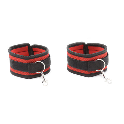 bed restraint system with padded cuffs and blindfold in red