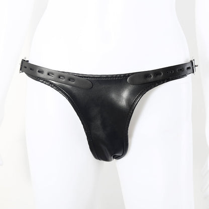 Model wearing black faux leather double penetration strap-on harness on a white background. 