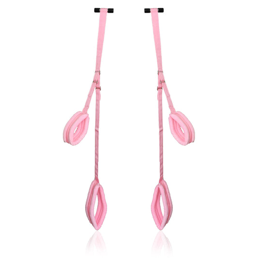 Pink door sex swing with padded straps for bondage play.