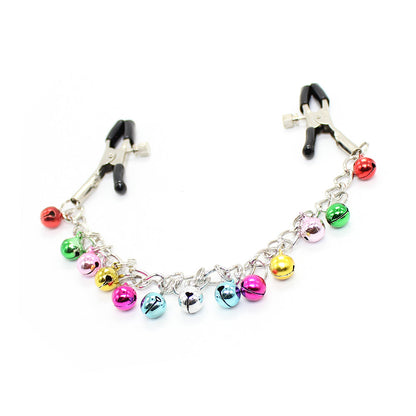 Nipple clamps with dangling rainbow-colored jingle bells and silver chain on a white background. 