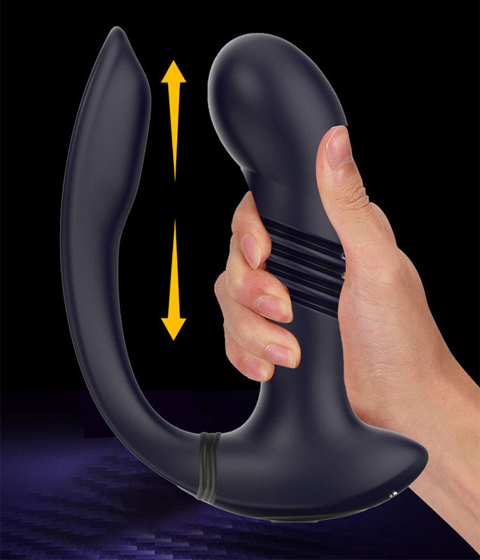 Black silicone product held by a hand with arrows indicating movement on a dark background.