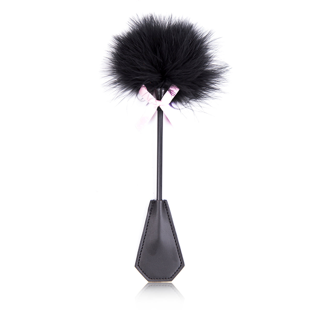 Black faux leather spanking paddle with fluffy feather tickler and pink satin bow.