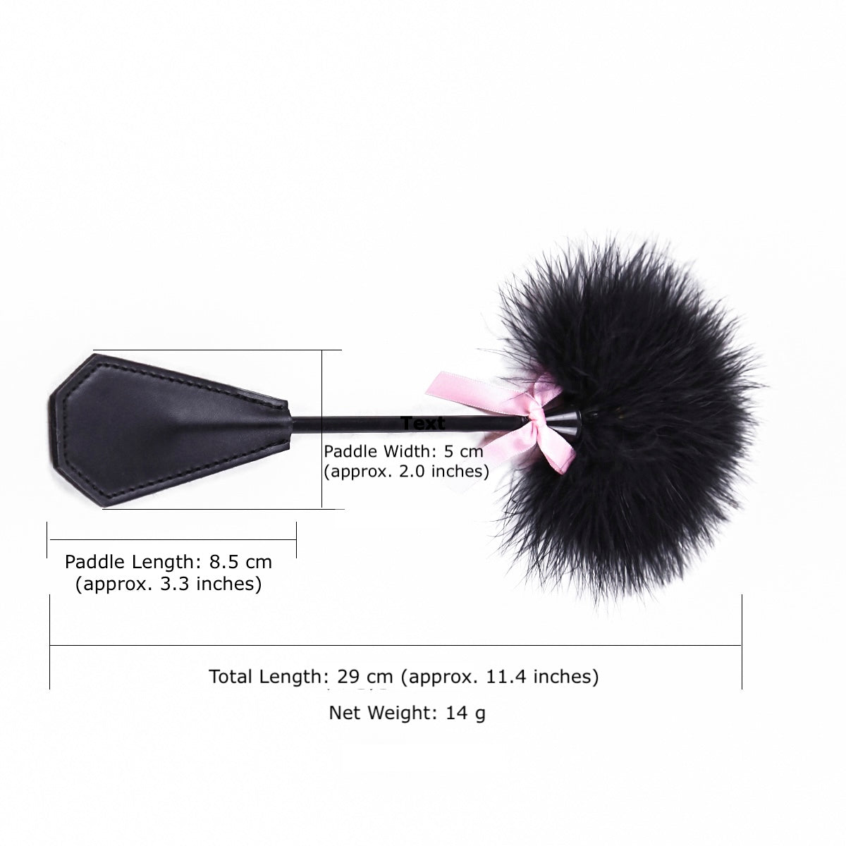 Black faux leather spanking paddle with fluffy feather tickler and pink satin bow with measurement. 