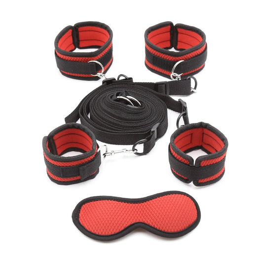 Under-mattress bed restraint system in red and black with four padded cuffs and a matching textured blindfold.
