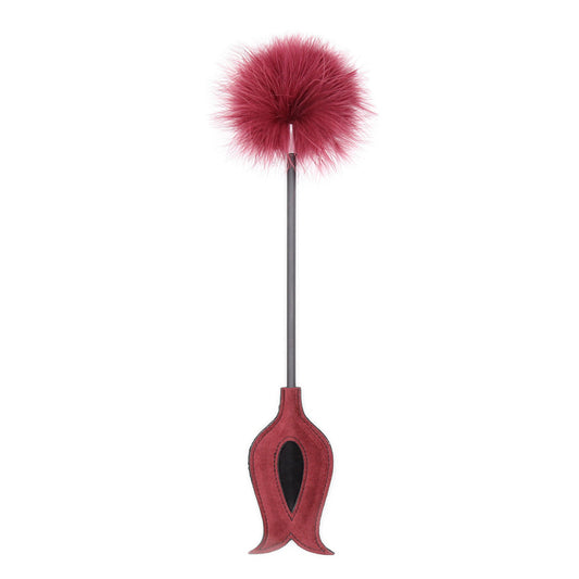Red feather tickler with faux suede spanking paddle.