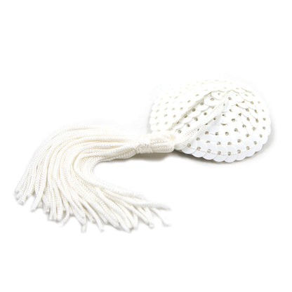 White sequin nipple pastie with dangling tassels.